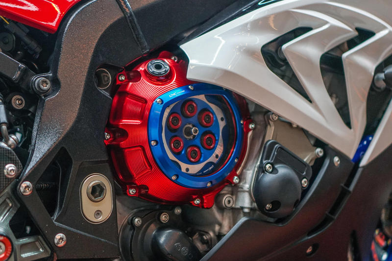 Carter frizione trasparente per BMW in colore rosso