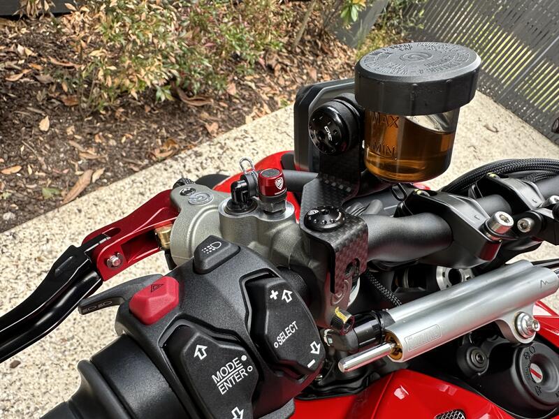 Front brake and clutch oil tank brackets - matt carbon